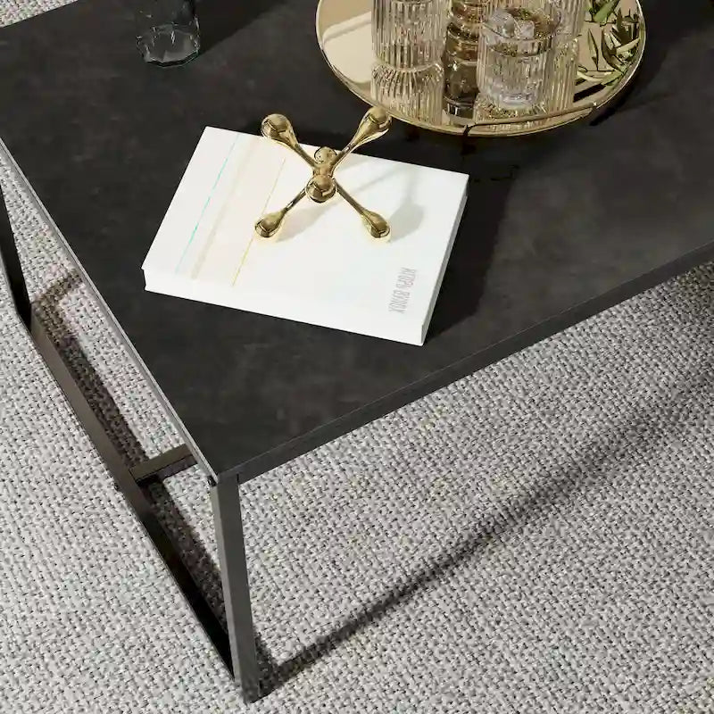 Table basse rectangulaire en pierre frittée, pieds en métal noir, style moderne, 100x60cm, capacité 150 kg